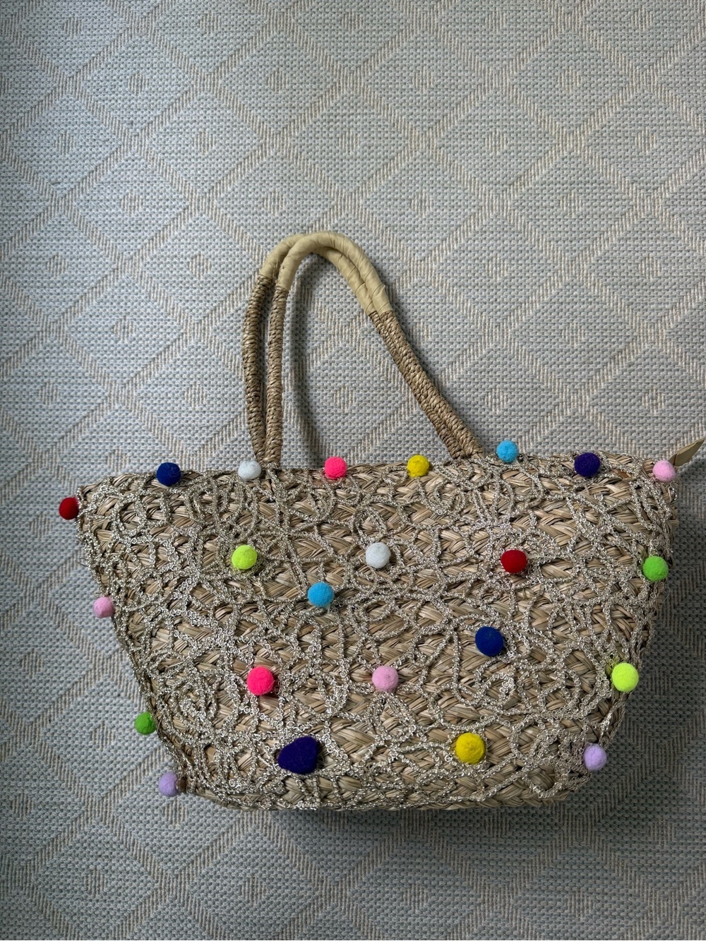 Woven Straw Tote with Colorful Pom-Pom Accents